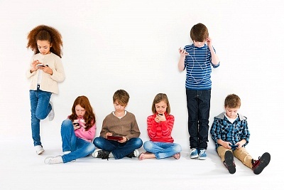 Children-Using-Different-Gadgets