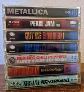 : le Black Album de Metallica, Ten de Pearl Jam, Use Your Illusion de Guns N' Roses, Nevermind de Nirvana, et Blood Sugar Sex Magik des Red Hot Chili Peppers